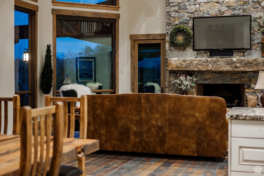 Living room with a stone fireplace