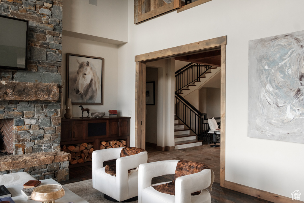 Living room featuring stairs and wood finished floors