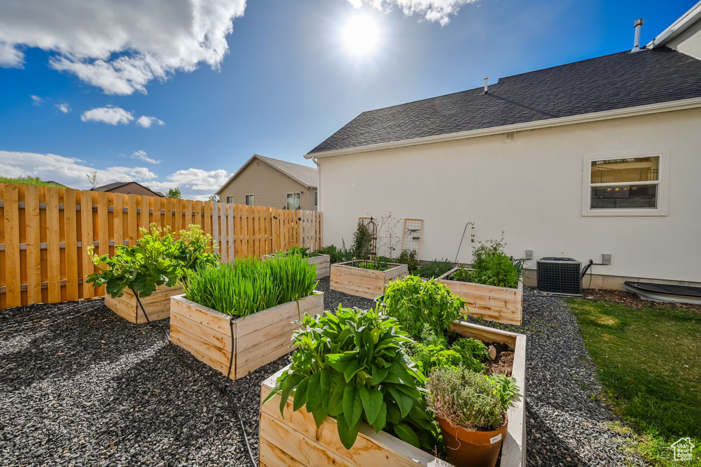 View of yard featuring central AC unit