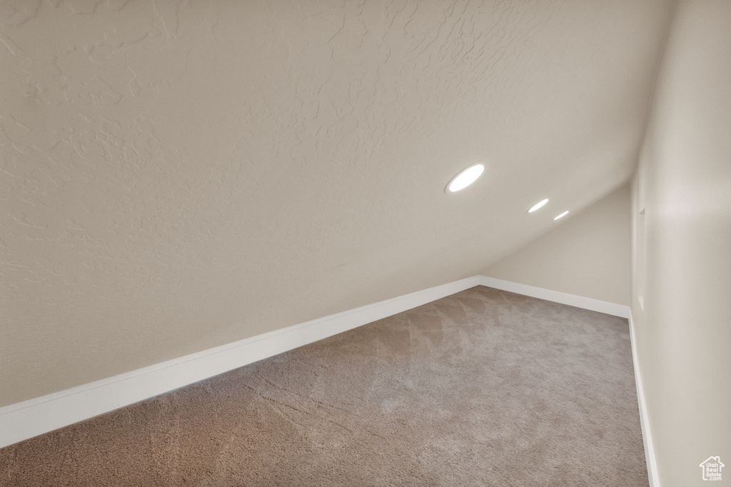 Interior space featuring vaulted ceiling