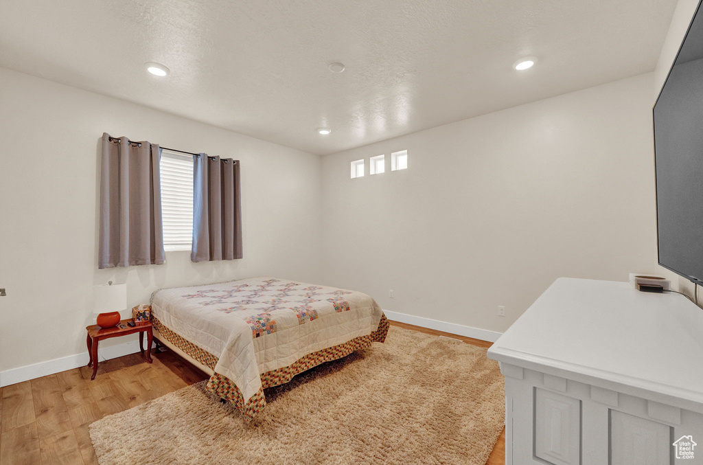 Bedroom featuring light wood-type flooring