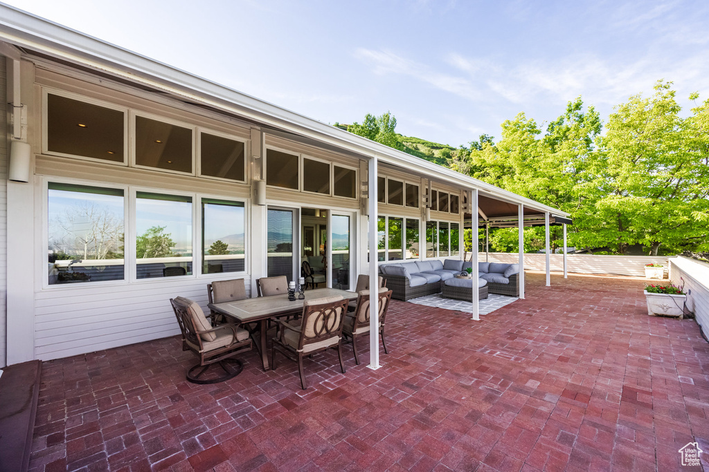 View of patio with outdoor lounge area