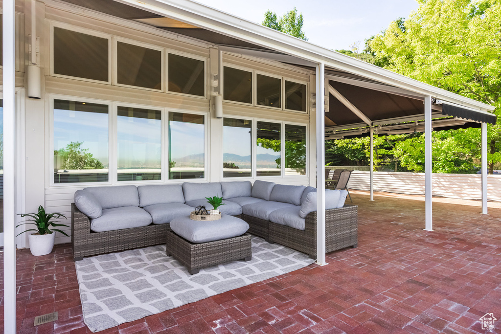 View of terrace with an outdoor living space