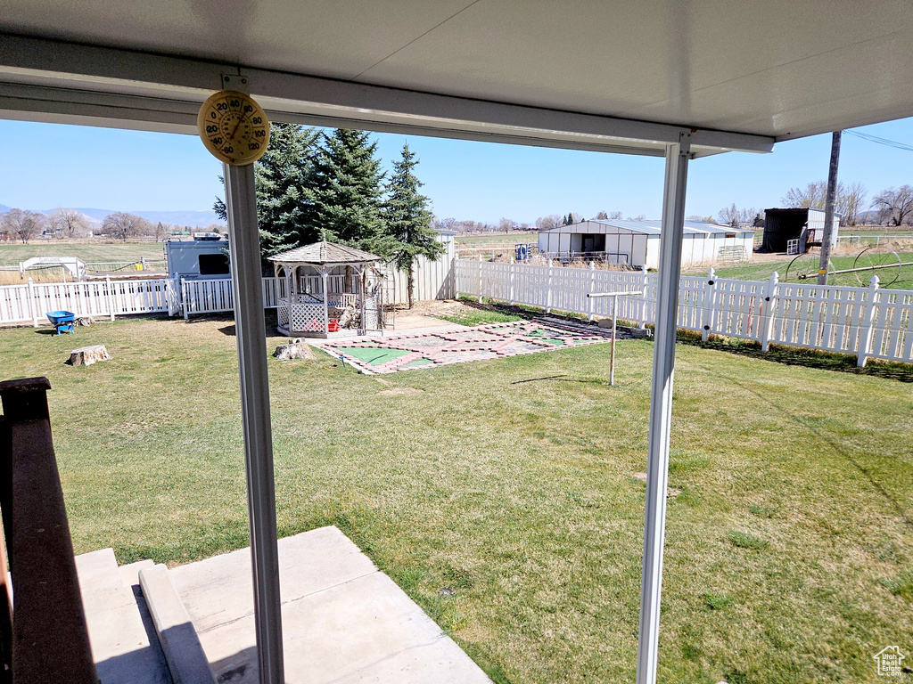 View of yard with a gazebo and a patio area