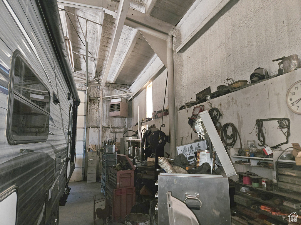 Garage featuring an AC wall unit