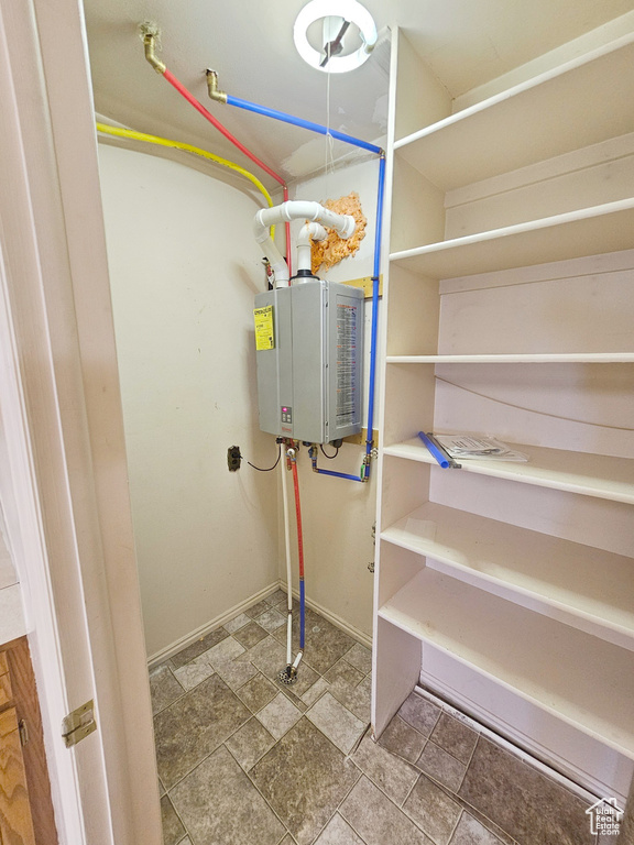 Utility room with tankless water heater