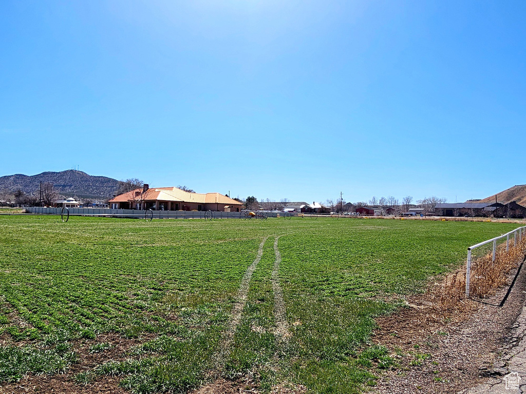 View of yard featuring a mountain view and a rural view