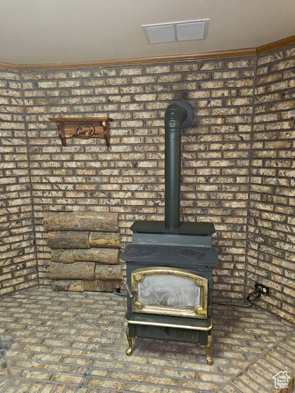 Room details featuring a wood stove