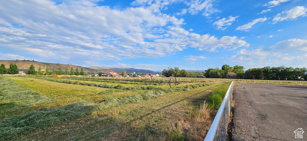 View of street featuring a view of countryside and a mountain view