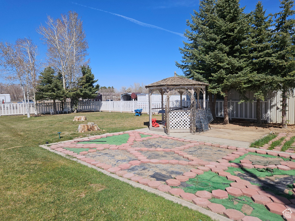 View of yard with a patio and a gazebo