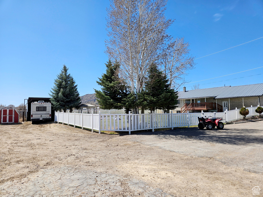 View of front facade featuring a storage shed