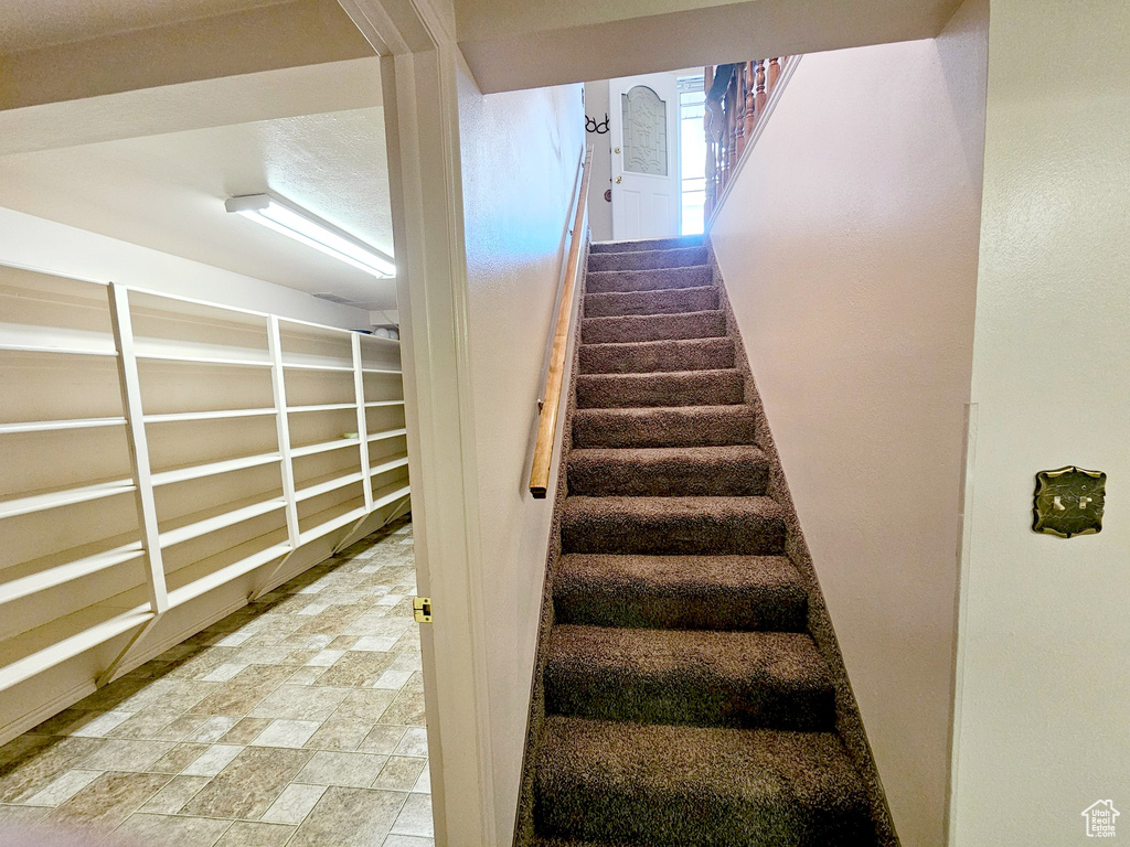 Staircase with tile flooring