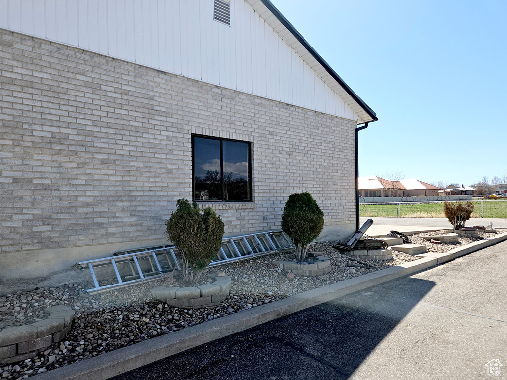 View of property exterior featuring a patio area