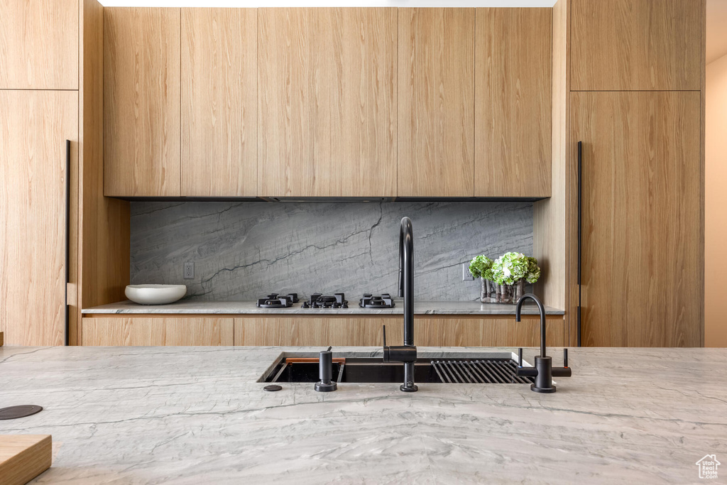 Interior space featuring decorative backsplash