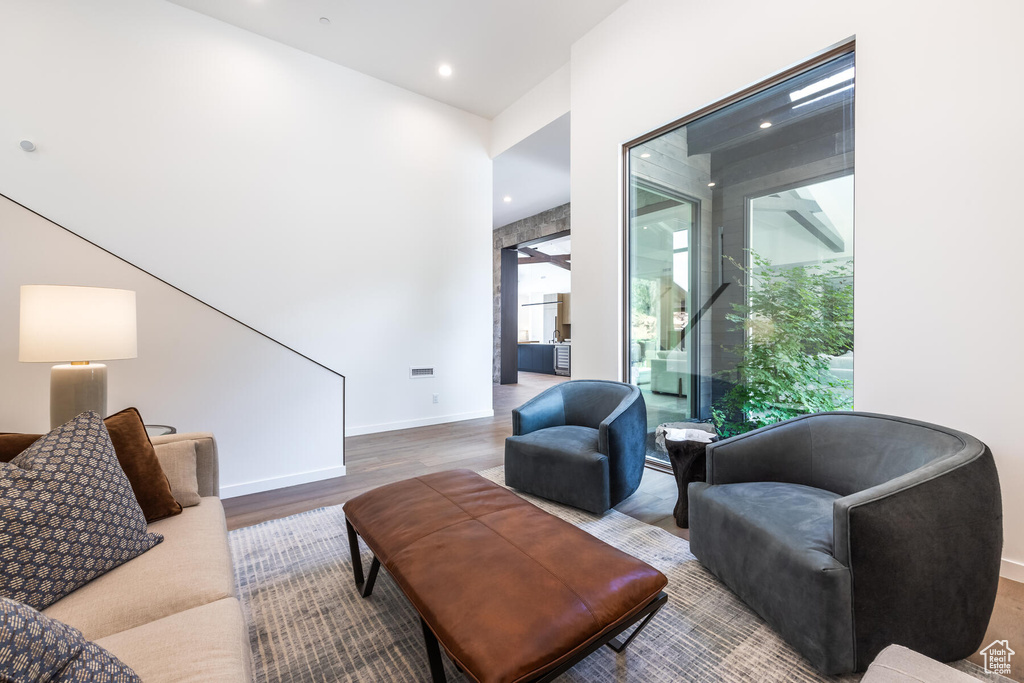 Living room with hardwood / wood-style floors