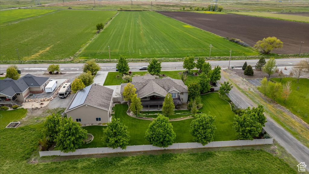 Birds eye view of property featuring a rural view