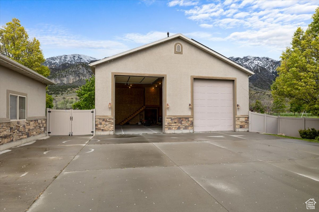 Garage featuring a mountain view