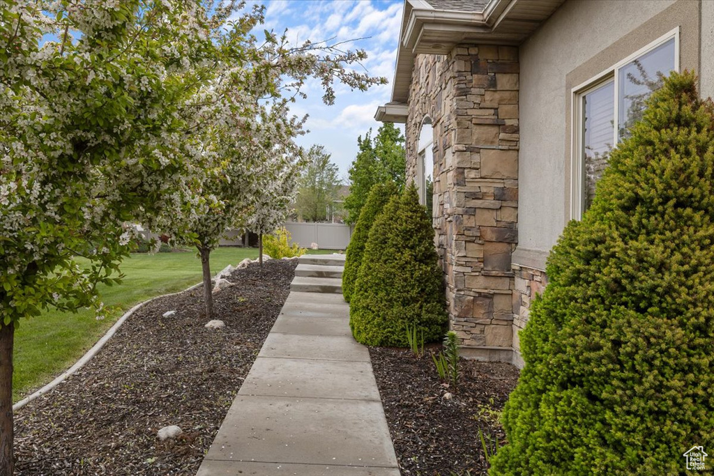 Exterior space featuring a yard