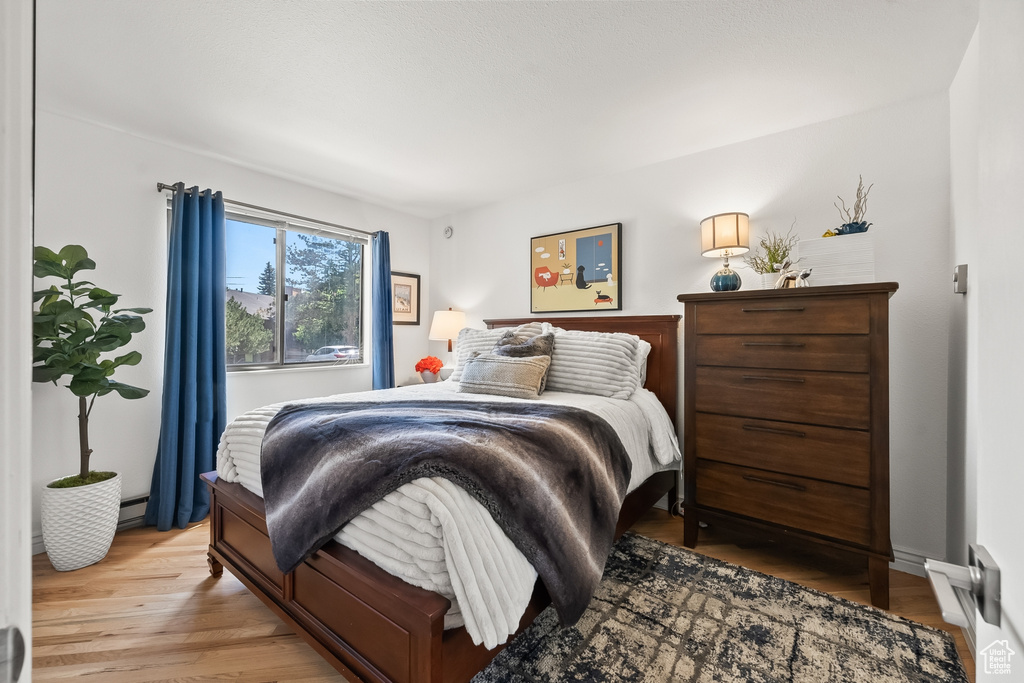 Bedroom with light wood-type flooring