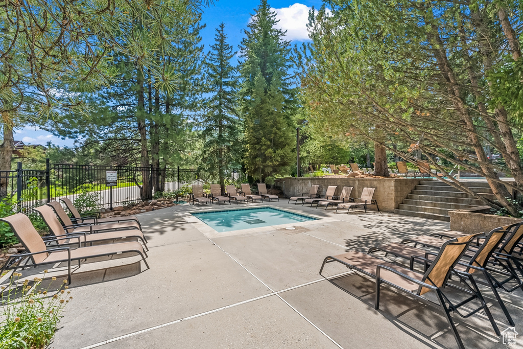 View of pool featuring a patio area