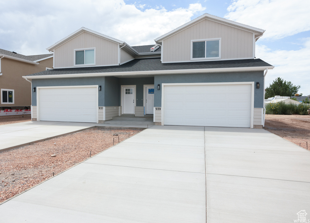 View of front of home with a garage