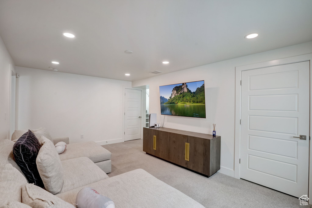 Living room with light colored carpet