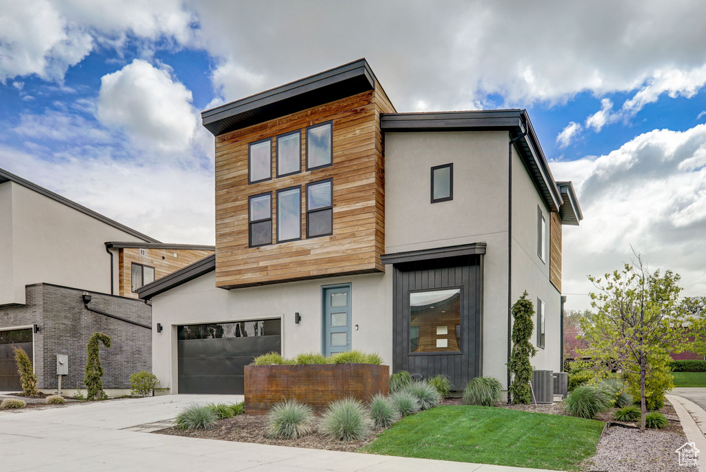 Modern home featuring a garage