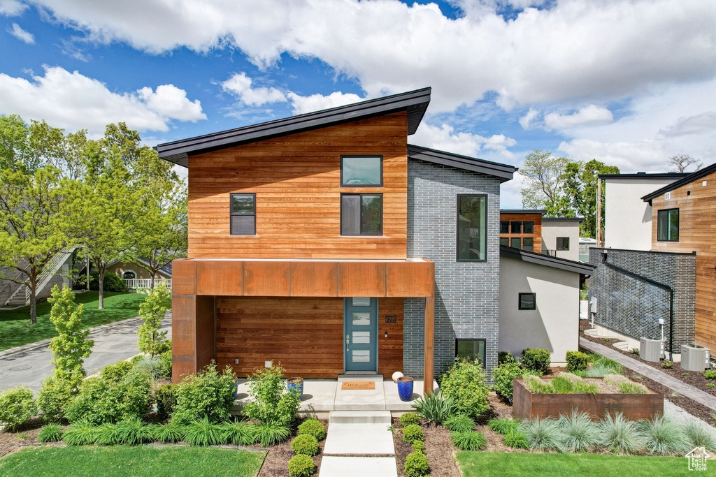 Modern home featuring central AC unit