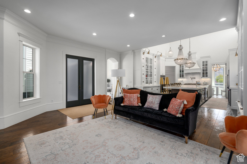 Living room featuring french doors and hardwood / wood-style flooring