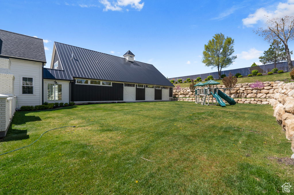 View of yard with a playground