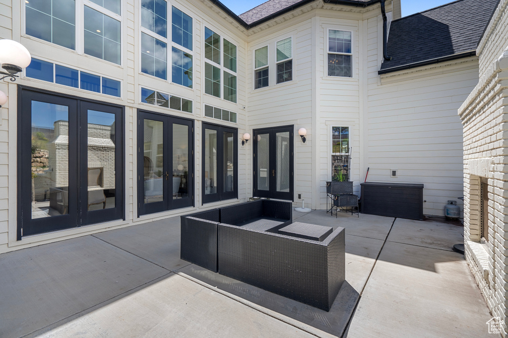 View of patio featuring an outdoor hangout area