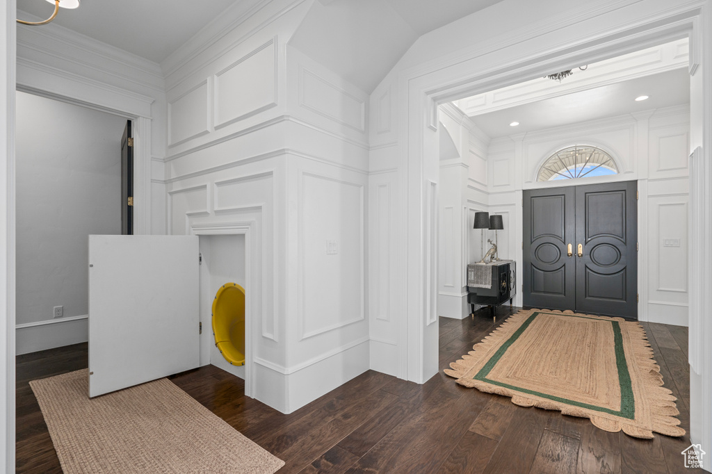 Foyer with dark wood-type flooring