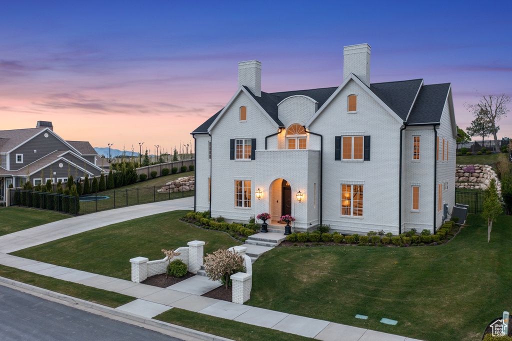 View of front of home featuring a yard