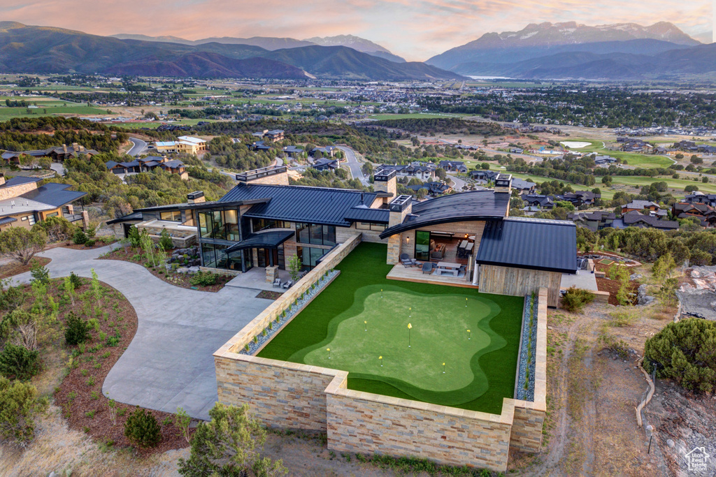 Aerial view at dusk with a mountain view