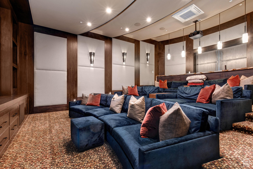 Home theater room with carpet floors