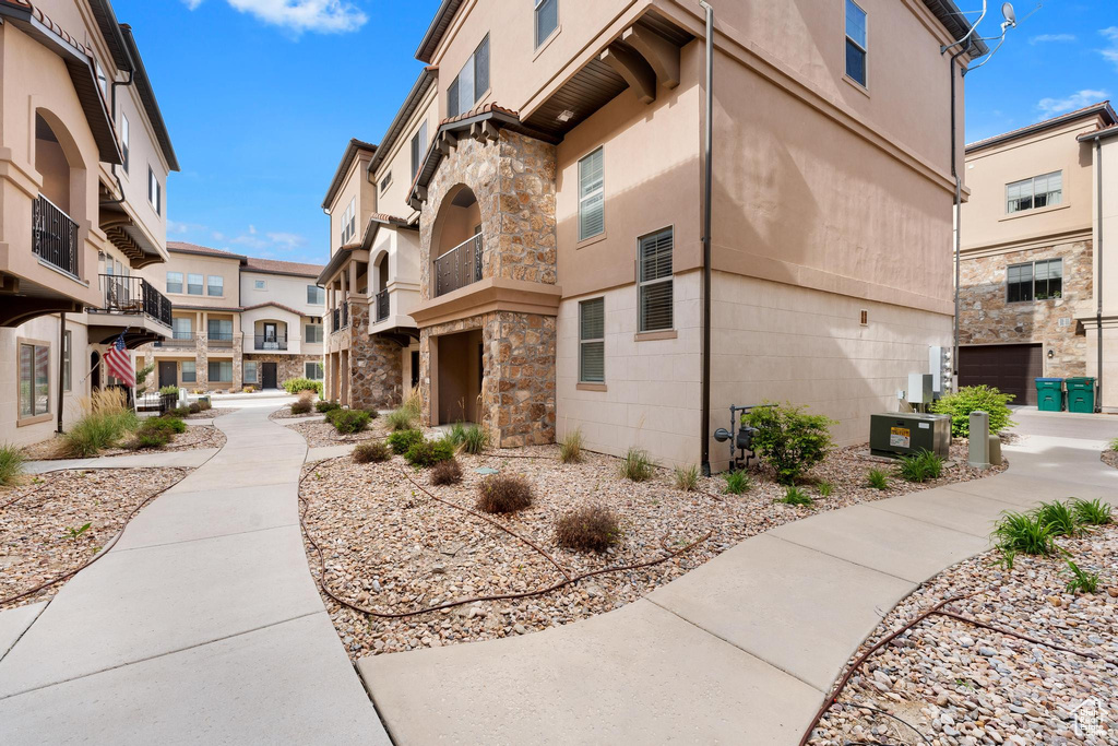 View of home's community with a garage