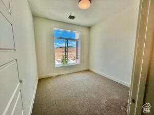 View of carpeted empty room