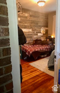 Bedroom with wood-type flooring