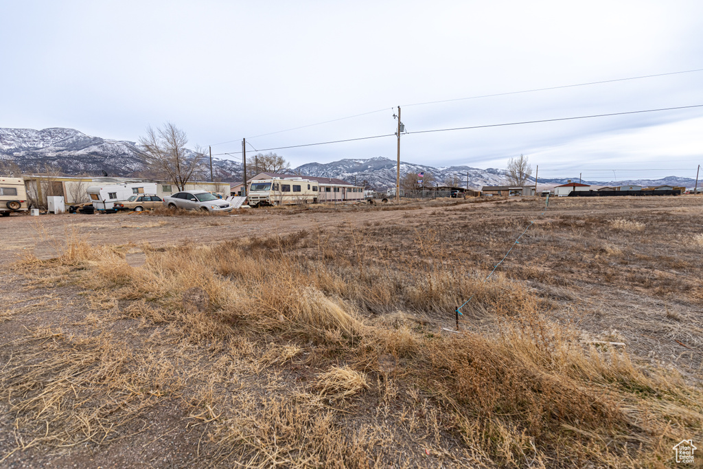 View of yard with a mountain view