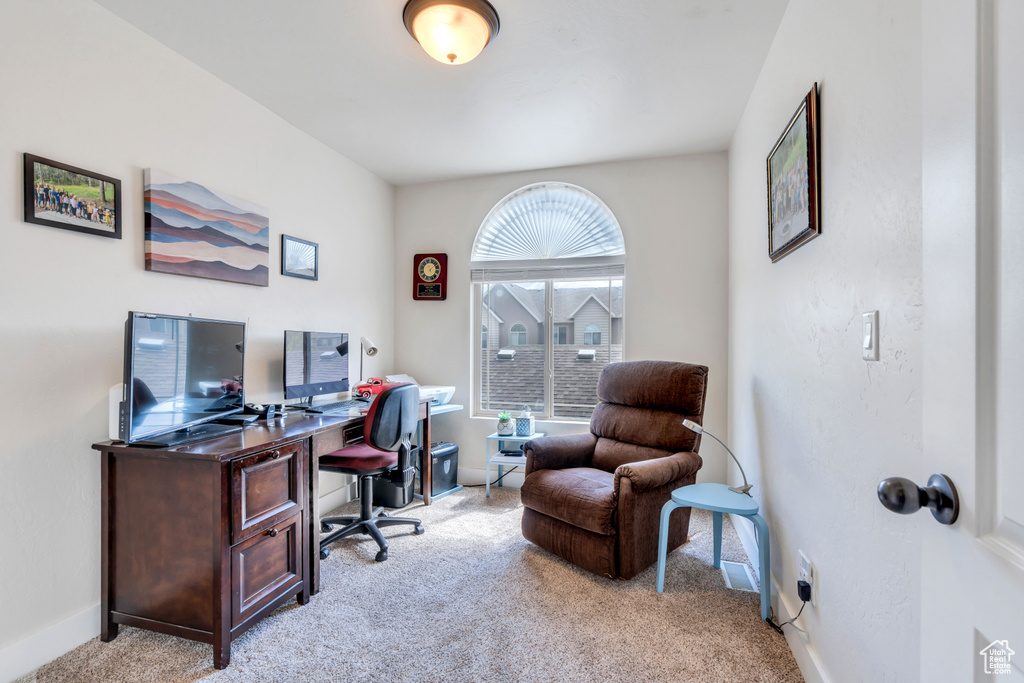 View of carpeted home office