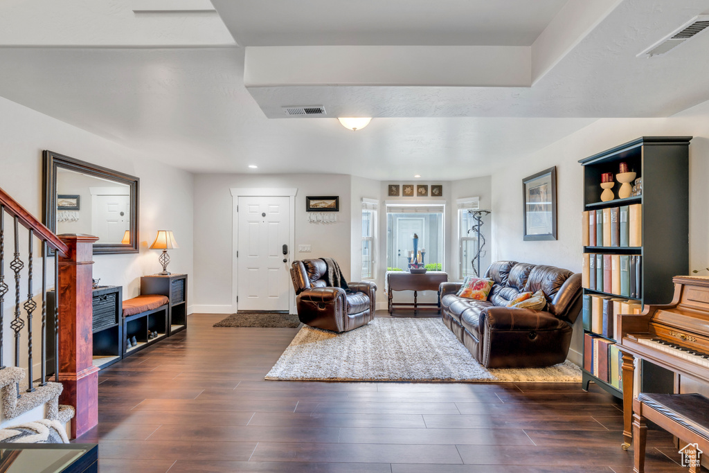 Living room featuring dark hardwood / wood-style floors