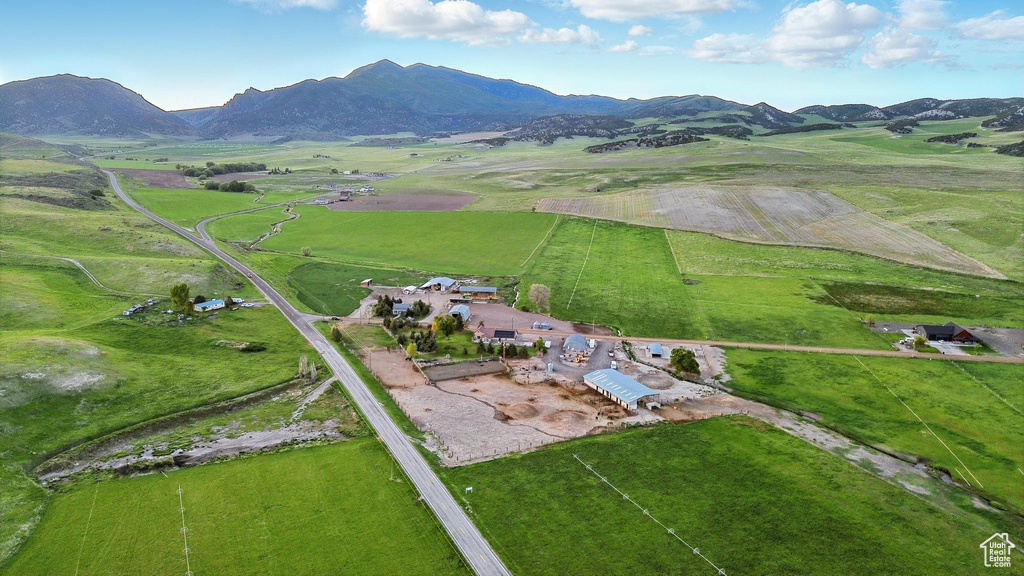 Aerial view of property\'s location with rural landscape and a mountain backdrop