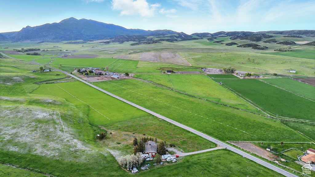 Aerial view of property\'s location with rural landscape and mountains