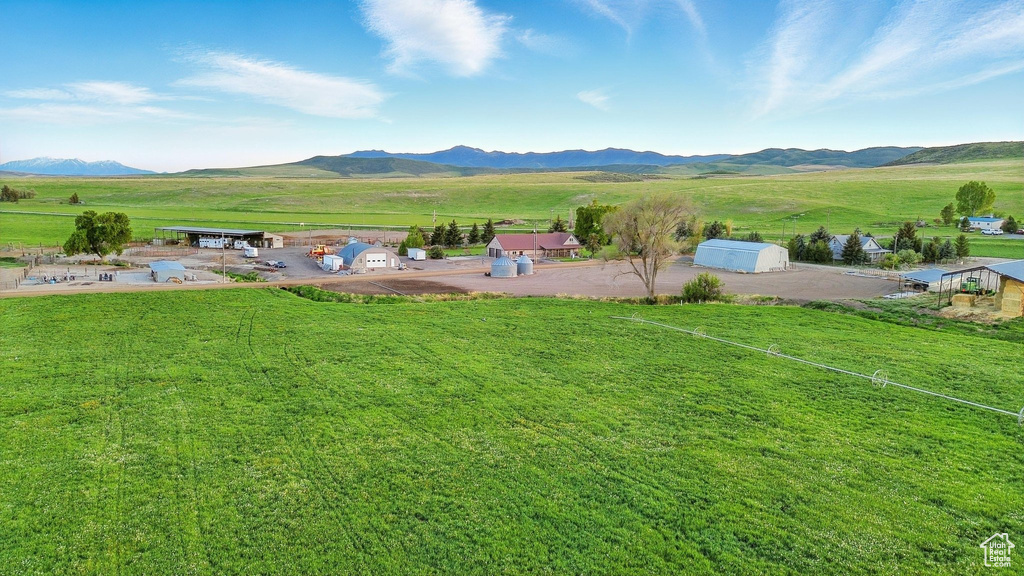 View of mountain background featuring rural landscape