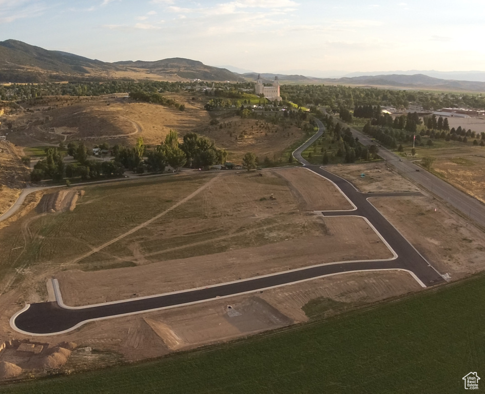 Drone / aerial view with a mountain view and a rural view