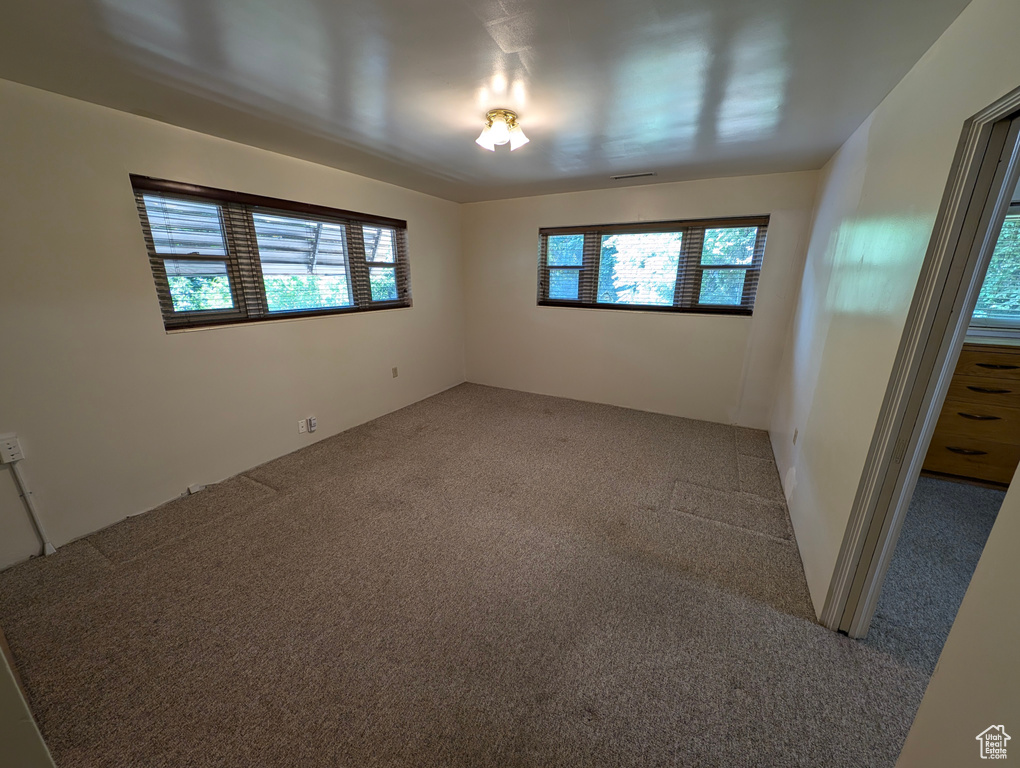 Empty room featuring carpet floors