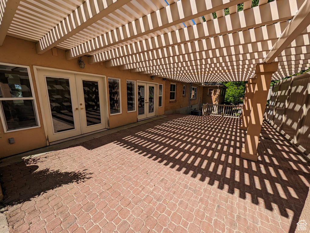 View of patio featuring a pergola and french doors