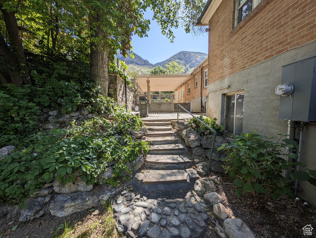 View of yard with a mountain view