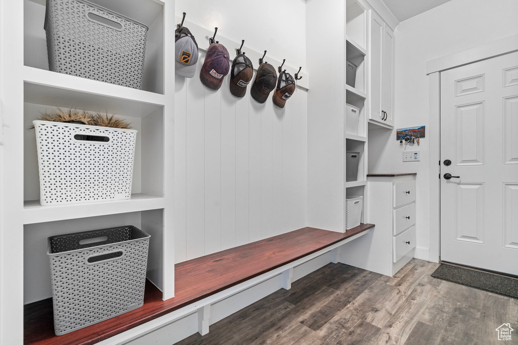 Mudroom with hardwood / wood-style flooring