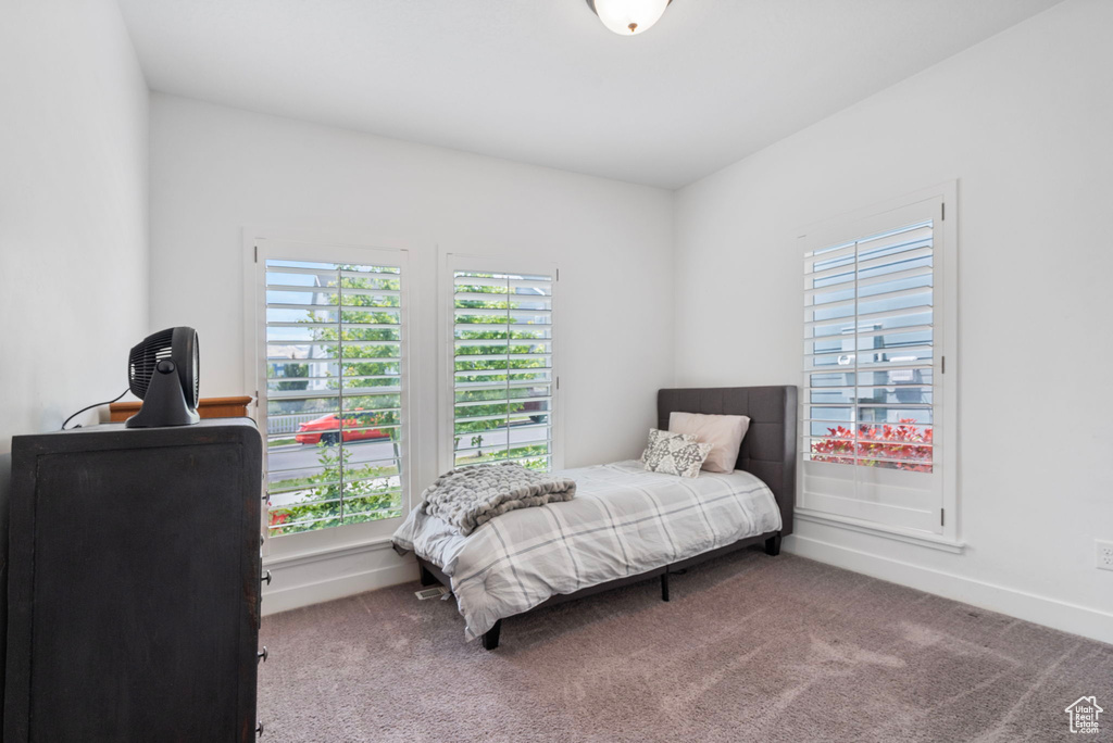 Bedroom featuring carpet flooring